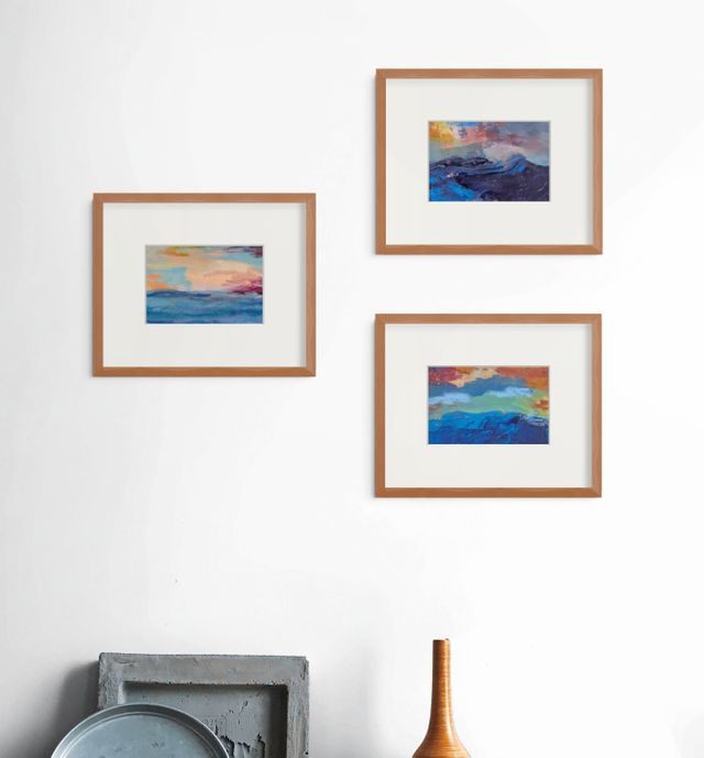 Three Apertures minis styled together on a wall: small abstract seascapes from a wider collection, each evoking a different feeling