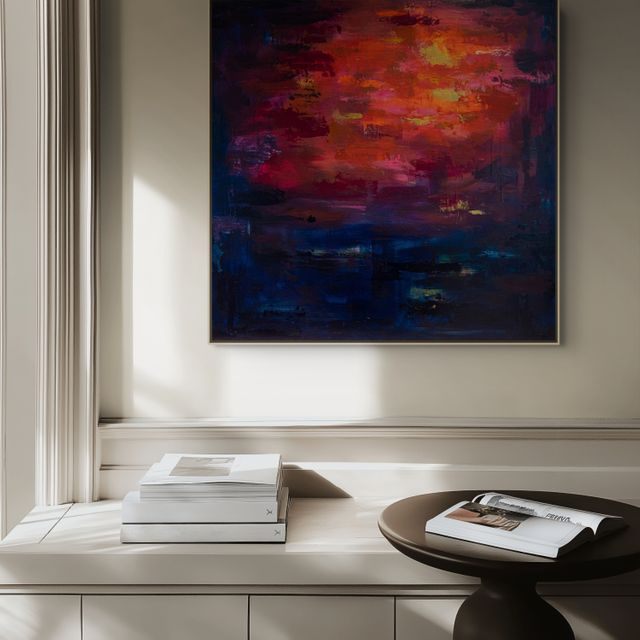 Sundowner by Jade Boswell: a large abstract painting of a summer sunset as the day cools into night, hung in a wall alcove above a table